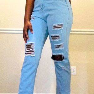 Distressed denim jeans